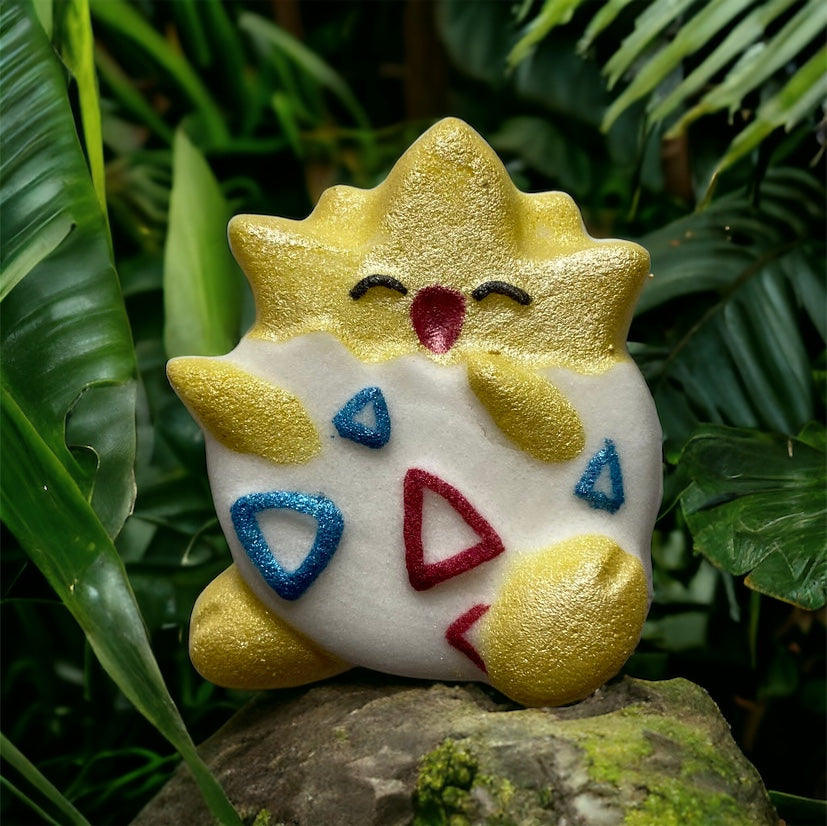 Pokémon prize Togepi bath bomb - Charming Cheshires, freshly washed sheets, tropical fruit, chamomile, linen, cedar, musk