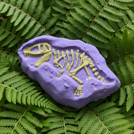 T Rex skeleton toy prize bath bomb - Charming Cheshire, petrichor, nettle, green leaves, moss, amber musk, melon